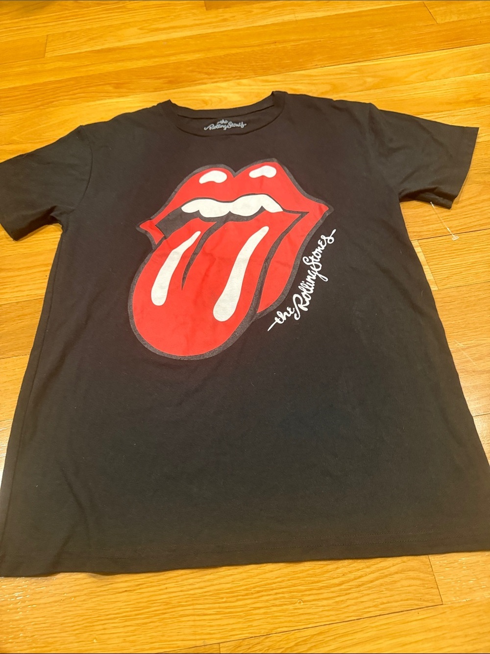 The Rolling Stones short sleeve shirt size medium.
